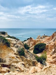 Rocky coastline, ocean horizon, rocks at the ocean, cliffs