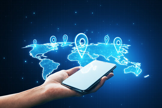 A hand presenting a smartphone with digital global network connection and location pins on world map background