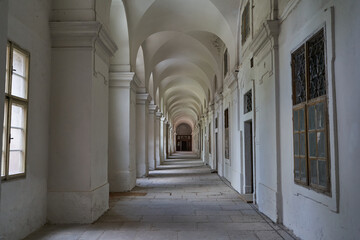 Prague, Czech Republic — June 17, 2023 - Long hallway of Invalidovna — baroque building for war...
