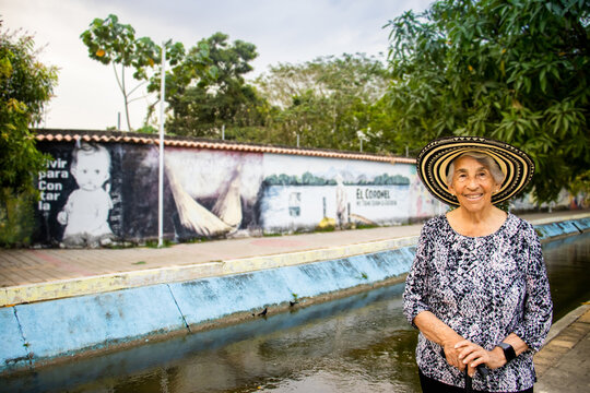 Senior woman tourist at the Macondo Linear Park in Aracataca the birthplace of the Colombian Literature Nobel Prize Gabriel Garcia Marquez