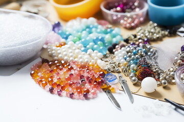 Obraz na płótnie Canvas Close up view of beads and pearls ready for making handmade jewelry by designer