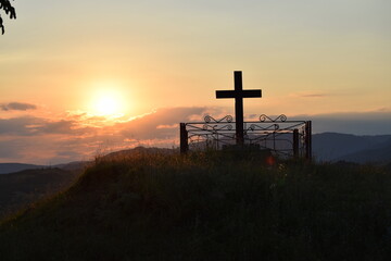 Sunset viewed from top of the hill and holy cross