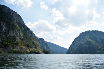 Lake view of two lands. Danube boat trip Iron Gates Romania