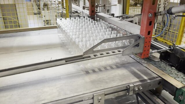 Plastic bottles packing machine.