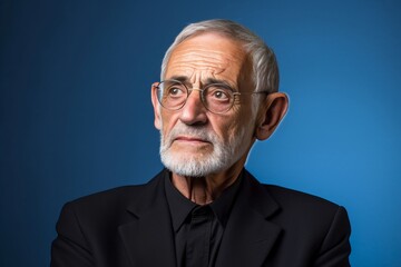Obraz premium Worried senior man reflecting on healthcare, retirement, mental health, memory loss