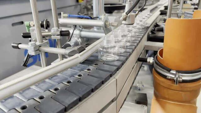 Quality control of bottles. Pet material. Small bottle, cosmetics.