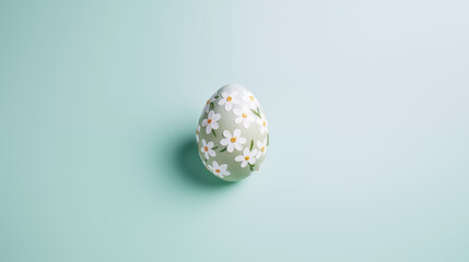 Fototapeta na wymiar Easter Egg Painted with White Flowers
