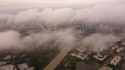 full clouds sky drone shot from top, urban planning from top 