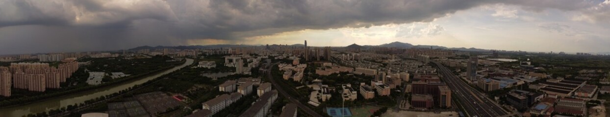 Obraz premium full clouds sky drone shot from top, urban planning from top 