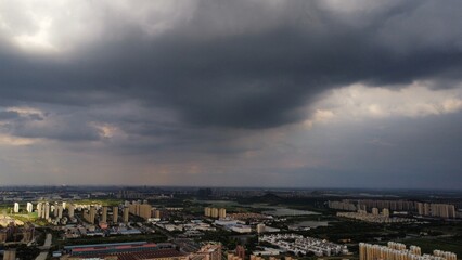 full clouds sky drone shot from top, urban planning from top 