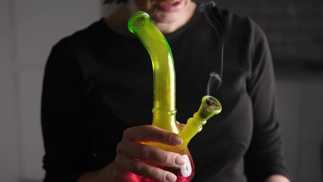 Young Woman Smoking Drugs Marijuana Weed With Bong, Drug Addiction
