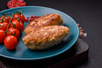 Delicious fresh fried minced fish cutlets with spices and herbs
