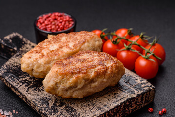 Delicious fresh fried minced fish cutlets with spices and herbs