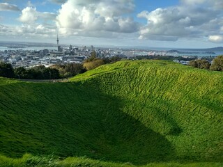  Mount Eden (Maungawhau) volcano crater in Auckland, New Zealand with panoramic view of Auckland