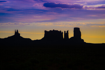 Monument Valley Sunset - The western sky frames the sacred, iconic shapes of Monument Valley