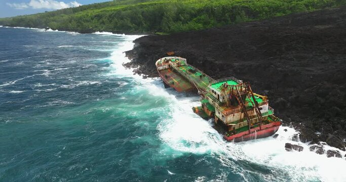 Saint Philippe, Reunion island, Tanker Tresta Star stranded on lava shore in Reunion island after Batsirai hurricane