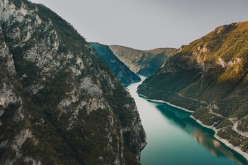 Aerial top evening view drone above blue turquoise river in Montenegro