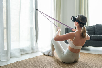 VR sport,Workout home vr,Fitness vr home,VR fit.Girl doing fitness in VR glasses home ,virtual...