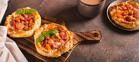 Chicago pizza pot pie with sausage, tomatoes and cheese on a board on the table web banner - obrazy, fototapety, plakaty