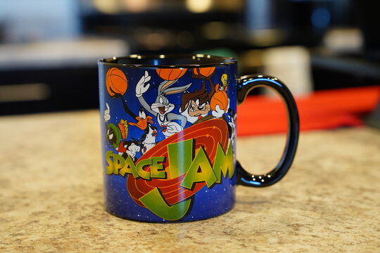 Looney Tunes Space Jam coffee Mug with coffee inside.