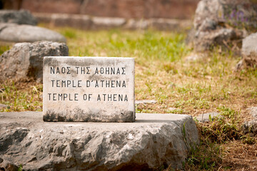 Title on a Stone:  Temple of Athena at ancient temple complex of Athena Pronaia in Delphi. Archaeological site, UNESCO World Heritage Site, Delphi, Greece.