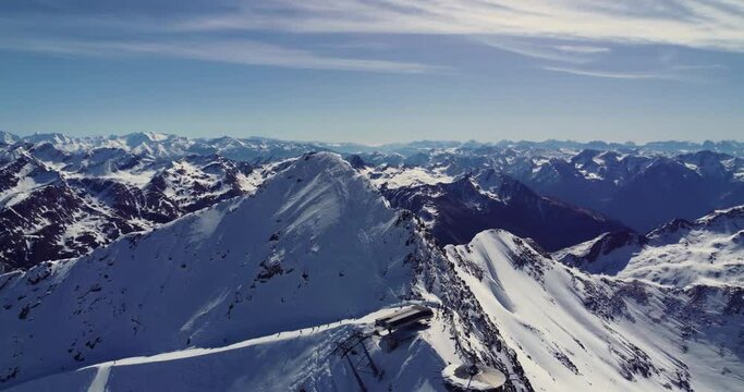 Aerial view footage of beautiful panoramic winter ski track in Alps, Solden ski resort, Tyrol, Austria.