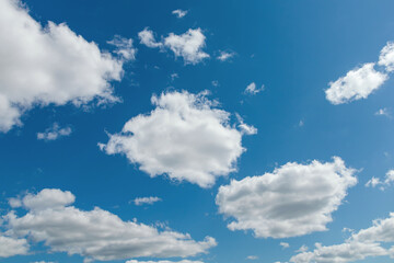 Naklejka na ściany i meble Clouds background. Blue sky with white clouds