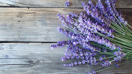 Obraz premium Lavender bouquet on wooden background banner