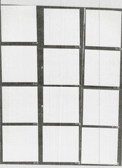 real flat scan of black and white hand copy paper contact sheet with empty film frames and scanning...