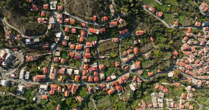 Aerial view Kakopetria Cyprus cityscape. Urban landscape from a bird's eye view of beautiful architecture and urban villages in the mountains on the island. High quality 4k footage
