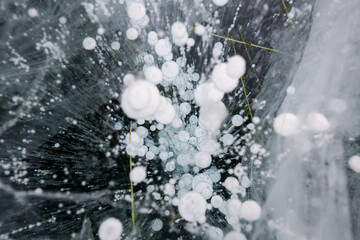 Gas methane bubbles frozen in blue ice of lake Baikal