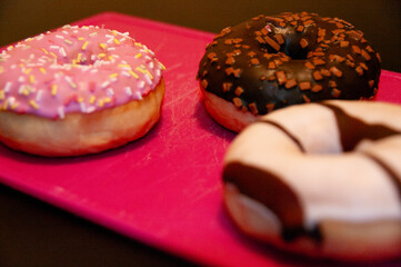 Set of doughnuts on colored background.