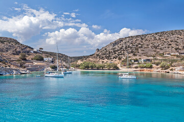 Amazing coastline with clear turquoise water in Schinoussa island, Greece, one of the Lesser Cyclades islands, in Cyclades, Greece, Europe.