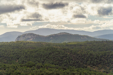 Fototapeta na wymiar Beautiful landscape with mountains on a cloudy morning, in Serra de Mariola, alicante (Spain)