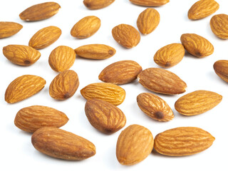 Fresh healthy almond nuts on white background.