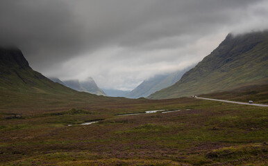 The A82 road as it passes through the Glencoe Mountains in Ballachullish, Scottish Highlands