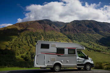 A motorhome stopped near Ben Nevis mountain in Fort William, Scottish Highlands - obrazy, fototapety, plakaty