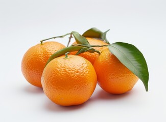 Fresh, ripe tangerines with leaves on a white background are ideal for a healthy diet.