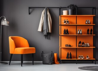 Stylish living room with gray wall and orange shelves.