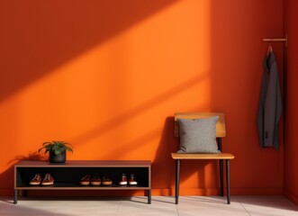 Coat and shoes displayed on a shelf against an orange wall.