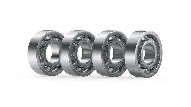 Group of four ball bearings on white background 
