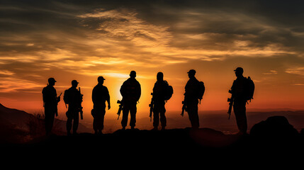 Fototapeta na wymiar silhouette of u s military men and veterans at sunset