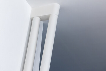 Abstract empty white minimal interior details, niche cornere with tubes