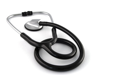 Black stethoscope on white background