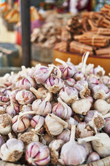  Delicious group of garlic on wicker bowl at street market