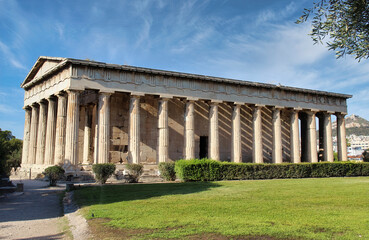 Fototapeta na wymiar The Temple of Hephaestus, (Theseion), is a Doric peripteral temple in the ancient Agora of Athens, Greece, atop the Agoraios Kolonos hill, it is one of the best preserved ancient Greek temples