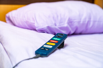 Hospital automatic position of bed. Comfortable medical bed with remote.