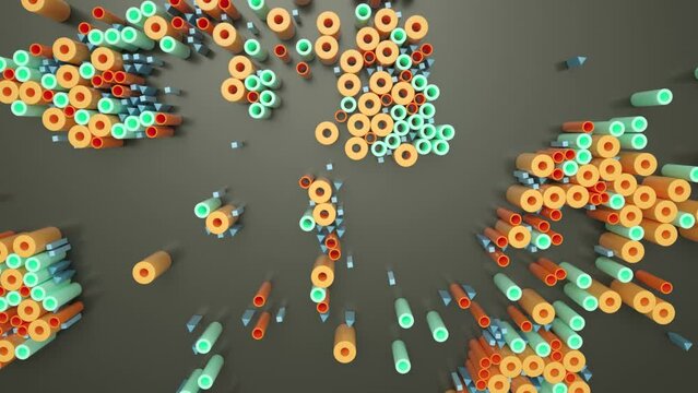 Part&iacute;culas de varios colores bailan sobre fondo oscuro.