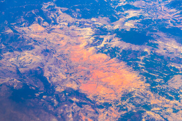 Flying airplane over Mexico Clouds Sky Volcanoes Mountains City desert.