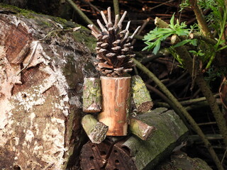 wooden man in nature